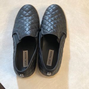 Steve Madden black quilted slip on sneakers